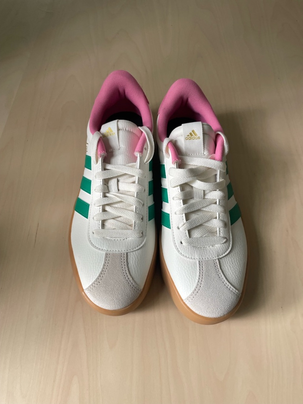 Brand new never worn Adidas White Sneakers with Green Stripes and Pink Lining